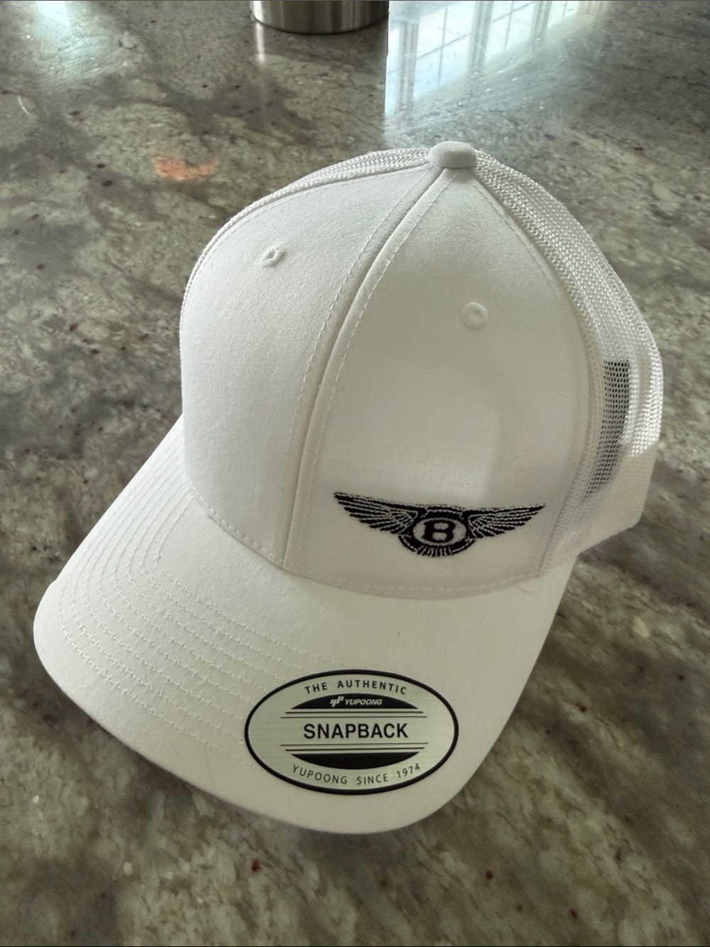 White Embroidered 'Bentley Indianapolis’ Wing Snapback Trucker Hat